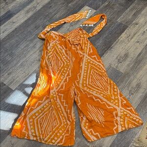 Anthropologie Orange and White Patterned Jumpsuit